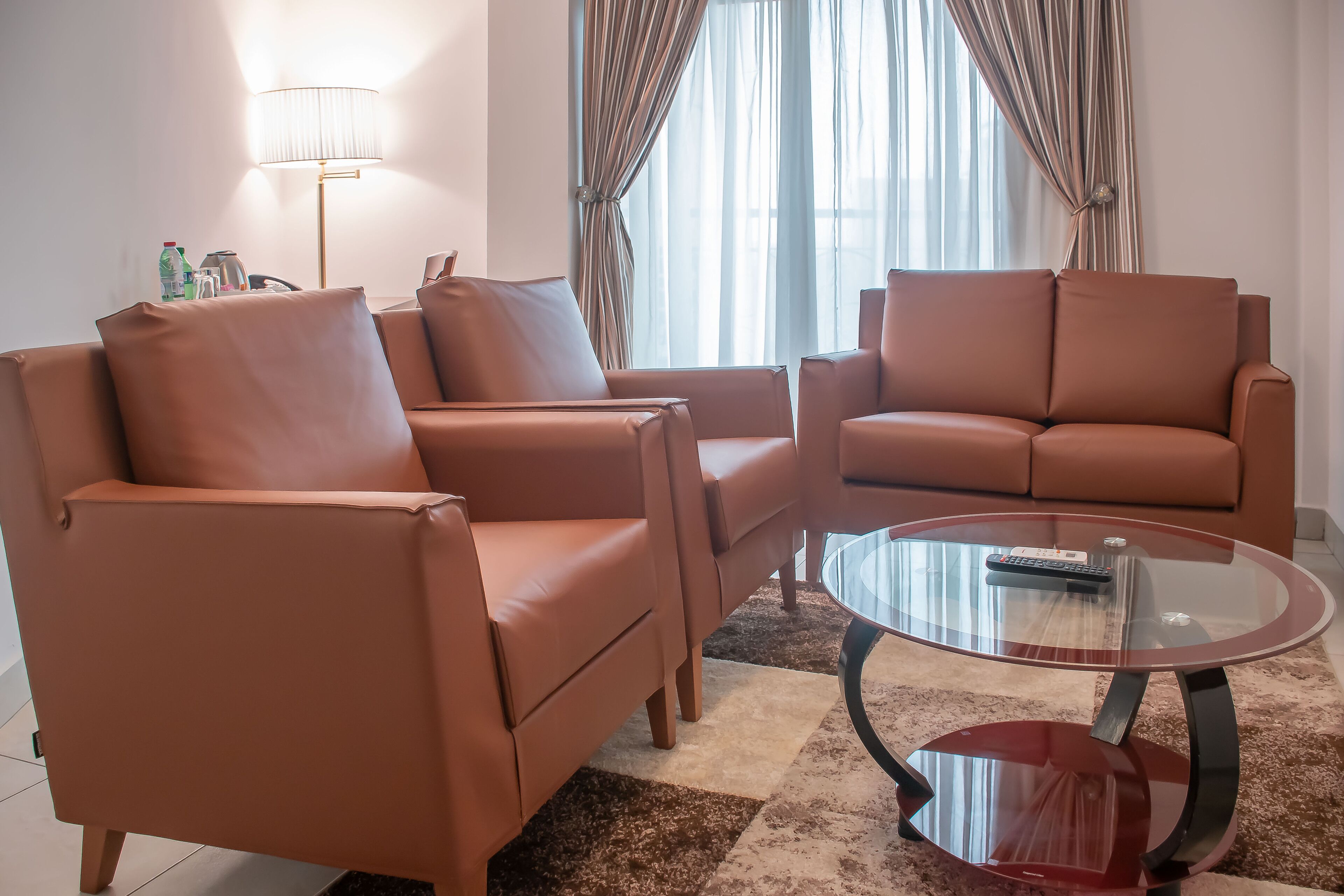 deluxe suite | living area | 43-inch smart tv with digital channels, tv, smart speakers