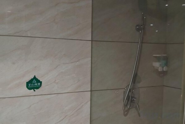 A shower with a glass enclosure, a handrail, and a soap dispenser on the wall. - Aishang Hotel (Ji'an People's Square Branch) (Ji'an)