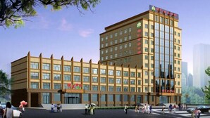 A multi-story hotel with a modern facade, large windows, and a prominent entrance area. - Jinjiang Business Hotel (Yilan)