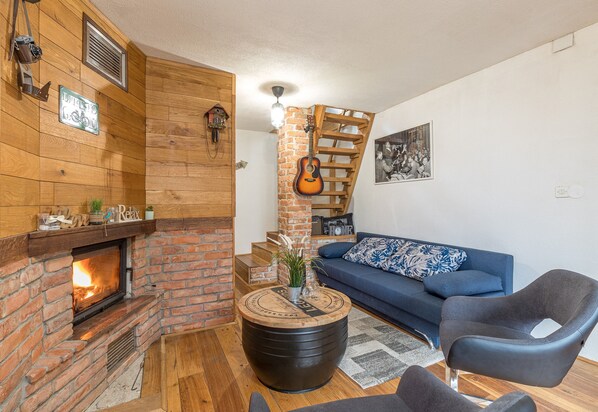 Casa familiar, varias camas, 2 baños, en el área del jardín (Primus Whirlpool Home) | Área de sala de estar | Televisión de pantalla plana 