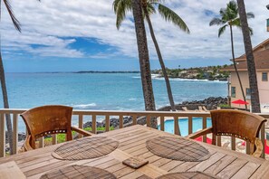 Outdoor dining - Oceanfront Sea Village #3212 retreat with stunning views and open living spaces (Kailua-Kona)