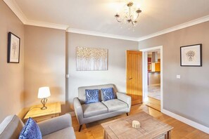 TV, fireplace, books, offices