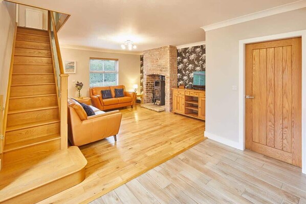 TV, fireplace, books, offices