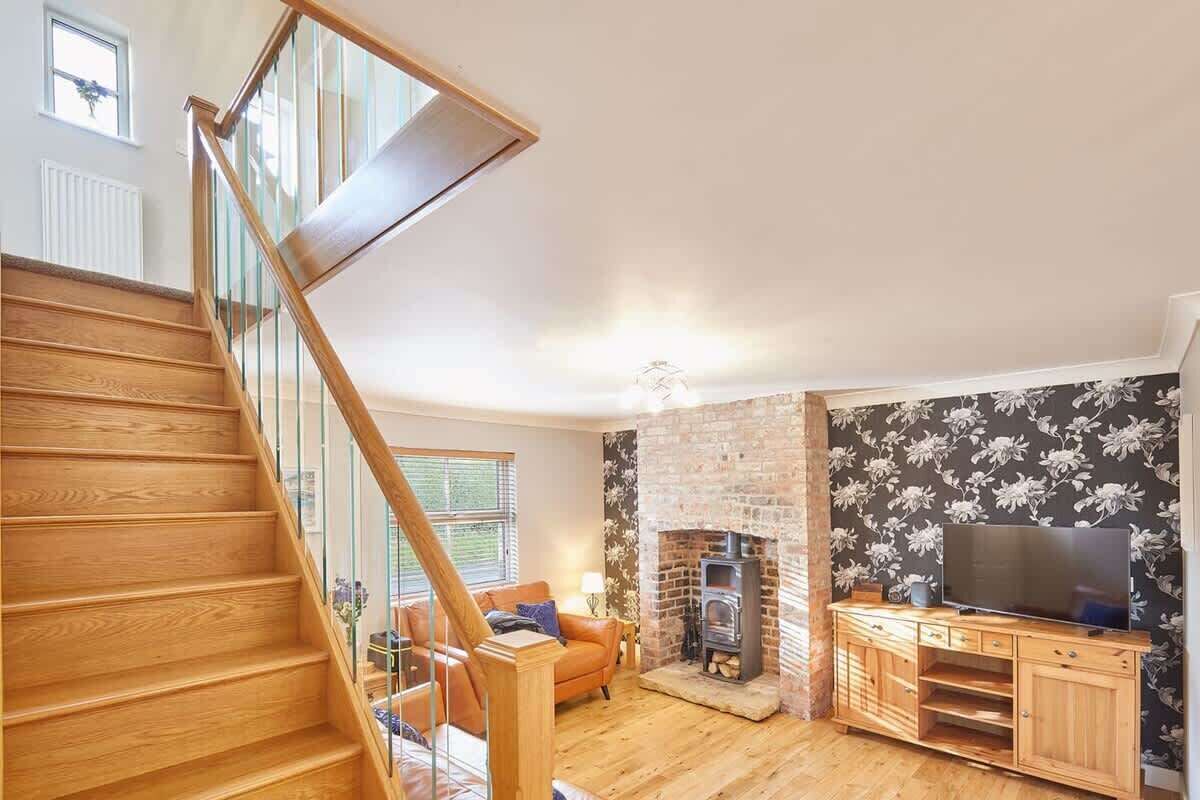 TV, fireplace, books, offices