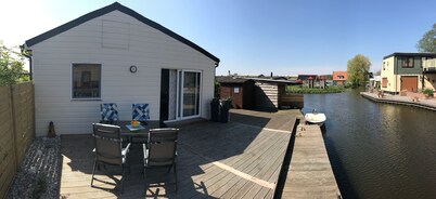 Modern, bright vacation home with lots of sun and its own jetty