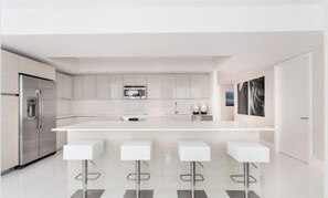 Fridge, microwave, oven, stovetop - Spectacular Waterview Condo at BeachWalk #1401 (Hallandale Beach)