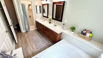 Combined shower/tub, hair dryer, towels, soap
