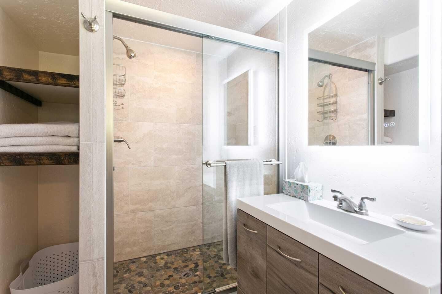 Shower, hair dryer, towels, soap