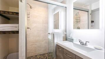 Shower, hair dryer, towels, soap