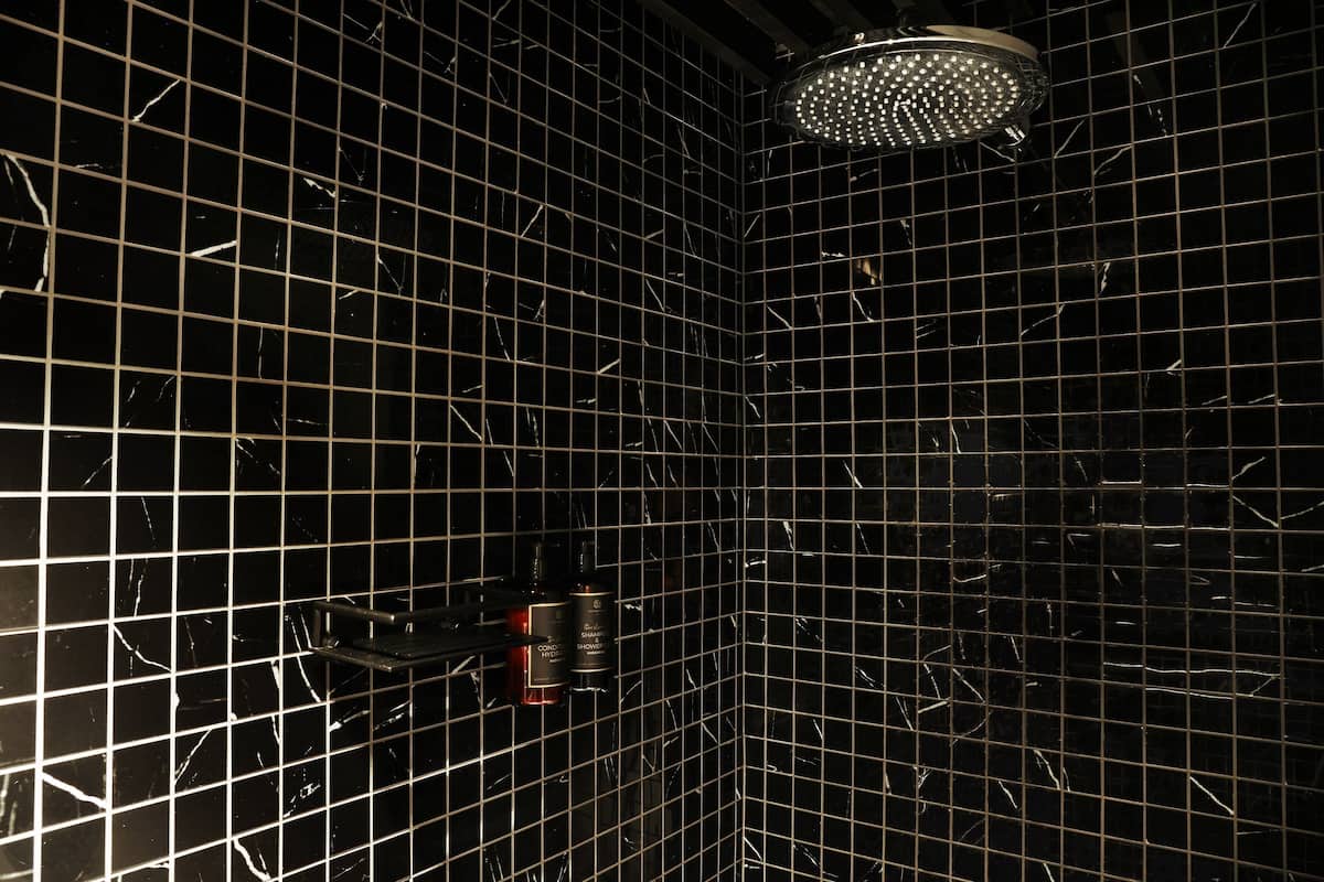 junior suite | bathroom | shower, rainfall showerhead, free toiletries, hair dryer