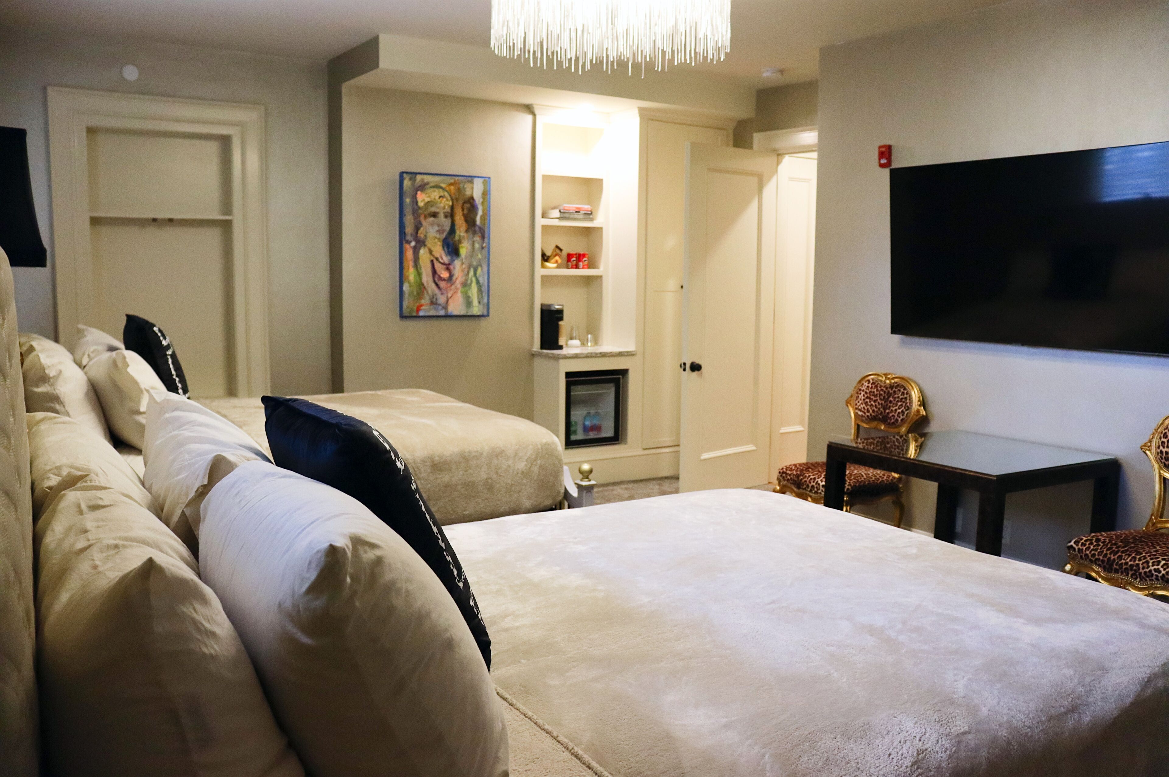 double - the champagne room | premium bedding, pillow-top beds, individually decorated