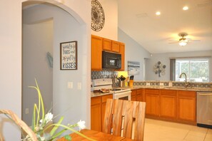 Fridge, microwave, oven, stovetop - Orlando BeachHouse ❤️ Expanded pool deck & HotTub Recent renos, close to Disney! (Davenport)