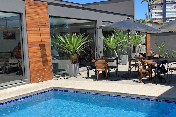 Outdoor pool, open 8:00 AM to 10:00 PM, sun loungers