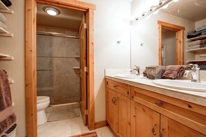 Combined shower/tub, hair dryer, towels, toilet paper