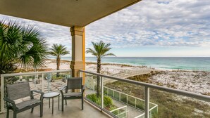 A balcony with a view of the beach and ocean. - BC 201A Beach Club 2B Gulf Front w/Daily Beach Chair Set! (Pensacola Beach)