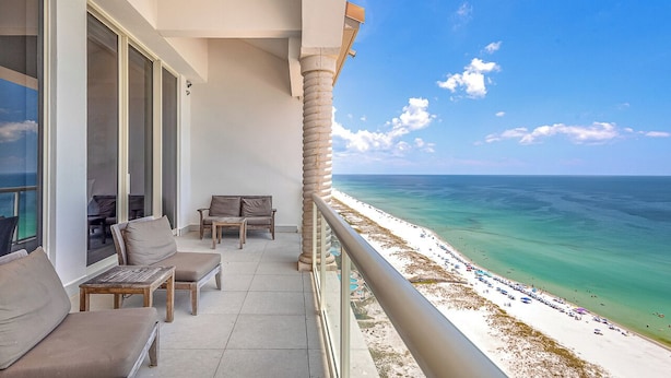 A balcony with a view of a beach and ocean. - 3B Beach Club Penthouse BC 2104 - Daily Beach Chair Set! (Pensacola Beach)