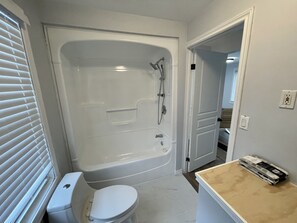 Combined shower/tub