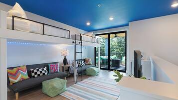 Apartment, 4 Bedrooms | Living area | 50-inch Smart TV with digital channels