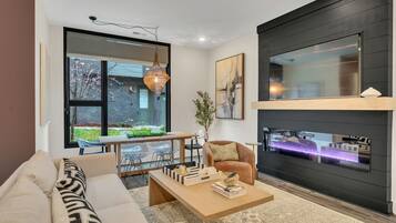 Apartment, Balcony | Living area | 50-inch Smart TV with digital channels