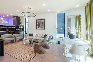 4-Bedroom | Living area | 50-inch Smart TV with digital channels - The Grove by AvantStay – Stylish Group Stay with Private Bathrooms (Nashville)