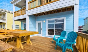 Step onto the deck and embrace the coastal breeze.
