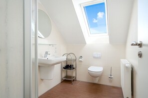 Een douche, een haardroger