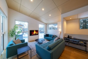 Luxury Chalet | Living area | 55-inch flat-screen TV with digital channels, TV, heated floors