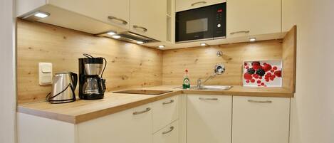 Fridge, coffee/tea maker, electric kettle, toaster