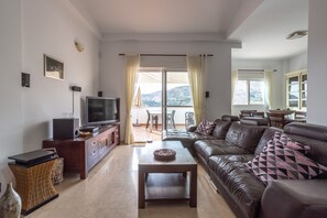 TV, fireplace - Holiday Home Casa Curumbico with Sea & Mountain View, Garden and Wi-Fi (Almunecar)