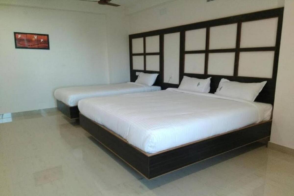 Habitación triple Deluxe | Wifi gratis y ropa de cama