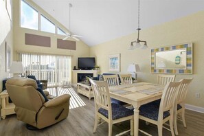 TV, fireplace - Spacious 3 Bedroom Bayside Condo in Sunset Beach with Outdoor Pool! (Ocean City)