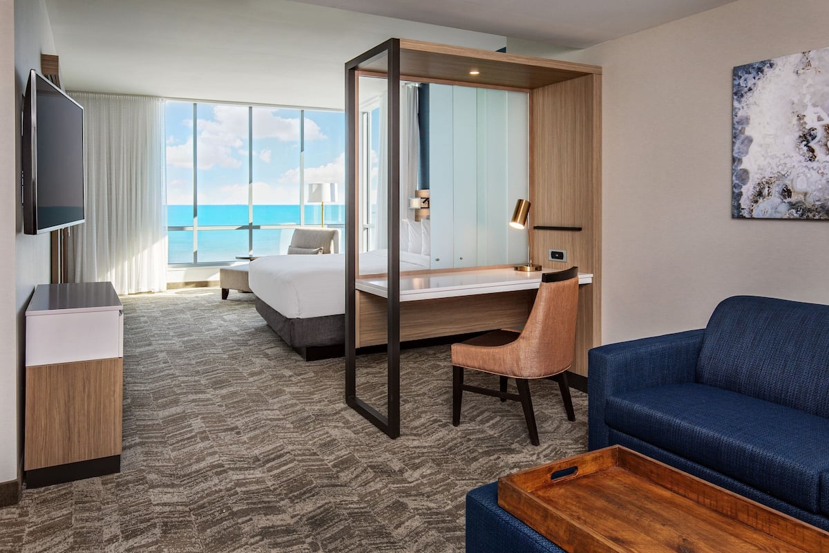 Junior Suite, 1 King Bed | Desk, blackout drapes, iron/ironing board, free WiFi