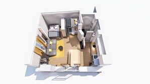 Una habitación de hotel compacta con cama, una pequeña zona de estar, kitchenette y baño.