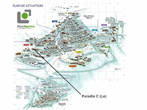 A detailed layout of a ski resort with marked areas like 'Alpe d'Huez 1860 m' and 'Paradis C (Le)'.