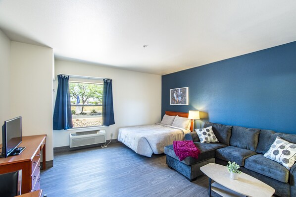 Desk, laptop workspace, blackout curtains, iron/ironing board