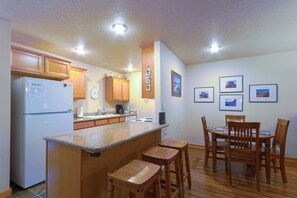 Coffee/tea maker, fridge, microwave, oven - Experience comfort at Better Than Home, a cozy condo w/ private hot tub (McCall)