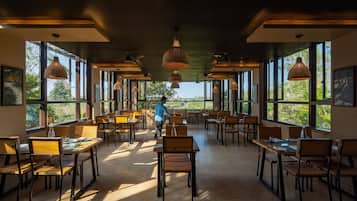 Breakfast, lunch, dinner served; Indian cuisine, garden views