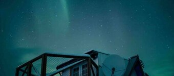 This A-frame is surrounded by mountain ranges that you can enjoy from the many windows