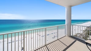 A balcony with a view of a beach and ocean. - Ocean Ritz 1503 • Luxury Beachfront Retreat (Panama City Beach)