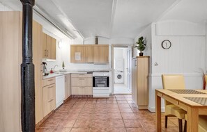 Fridge, stovetop, dishwasher, coffee/tea maker