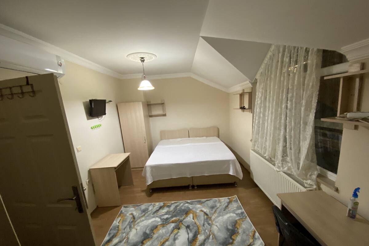 Hypo-allergenic bedding, memory-foam beds, desk, laptop workspace