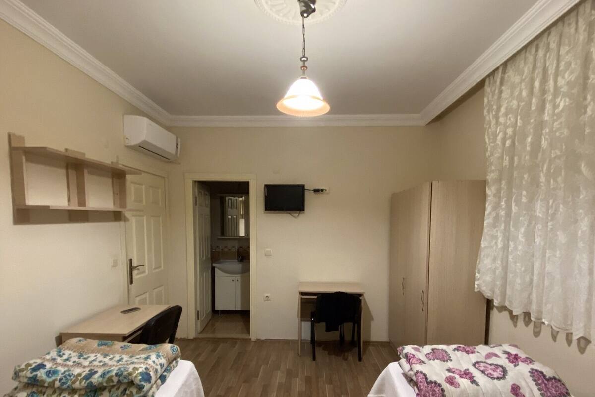 Hypo-allergenic bedding, memory-foam beds, desk, laptop workspace