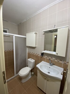 Shower, hydromassage showerhead, slippers, soap