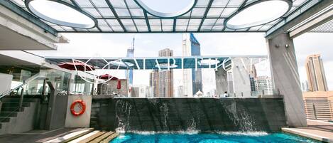 Outdoor pool, pool umbrellas, pool loungers