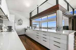 Fridge, microwave, oven, stovetop - Banyandah - Luxury Architect Designed Straddie Beachhouse (Point Lookout)