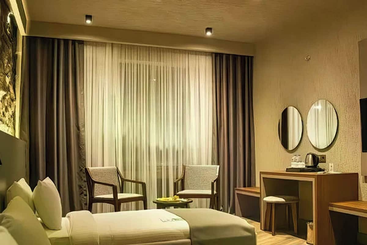 Ylelliset vuodevaatteet, Select Comfort -patjalliset sängyt, minibaari