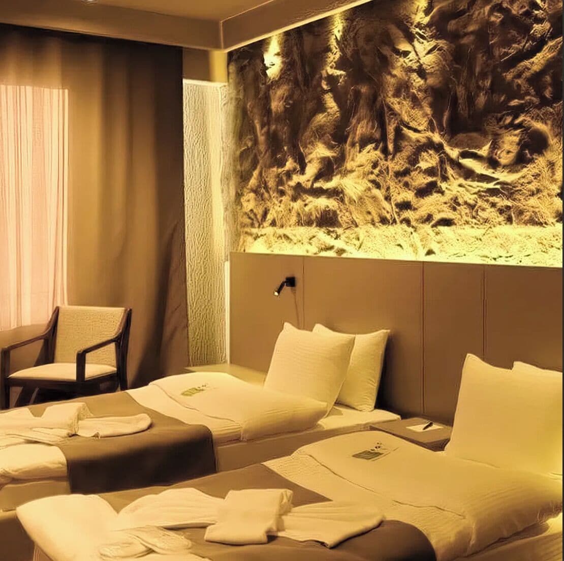 Habitació amb dos llits individuals superior | Roba de llit hipoal·lergògena i matalassos de la marca Select Comfort 