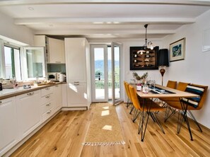 Family House, 2 Bedrooms, Sea View, Beachside | Living area | 80-cm TV with satellite channels - Beach House Calendula (Razanac)