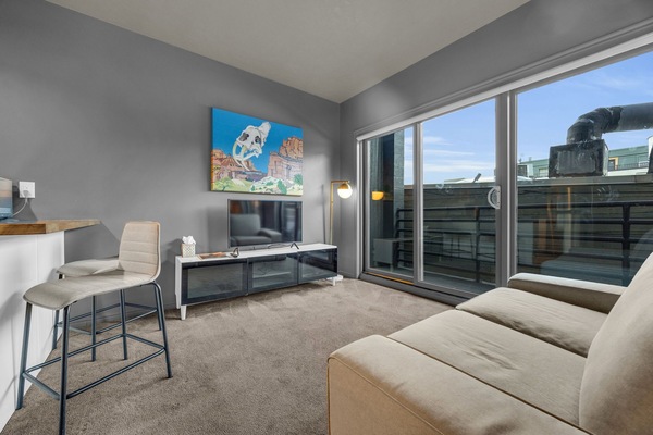 Living area: Smart TV with cable (40"), Building-controlled central heat and A/C (air speed can be adjusted by guests)