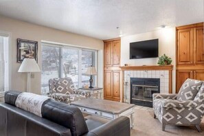 Flat-screen TV, fireplace, offices